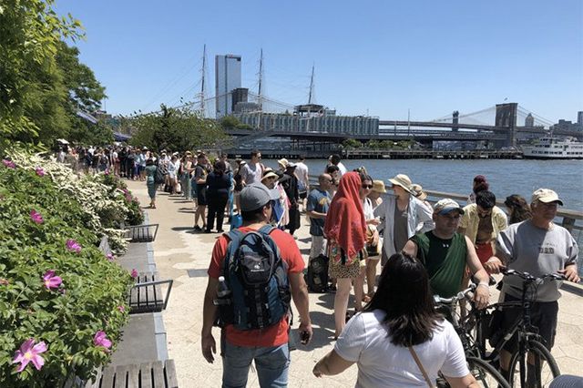 People waiting for the ferry at the South Street Seaport